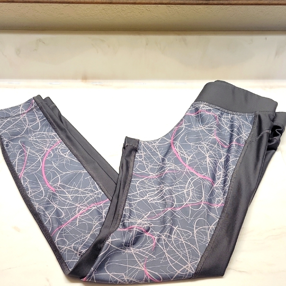 Under Armour gray with pink design size medium leggings
